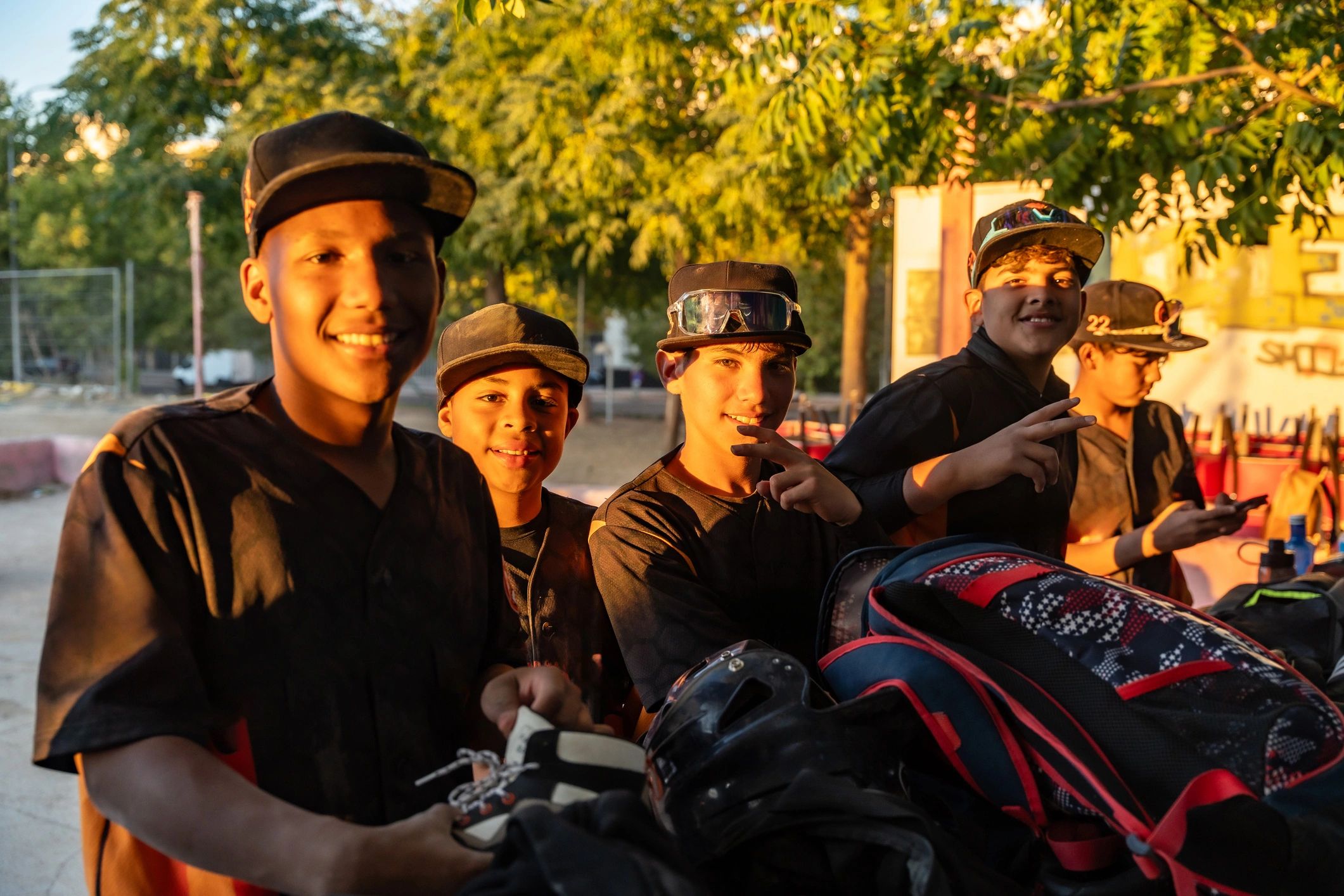 Young baseball team boys smiling before game